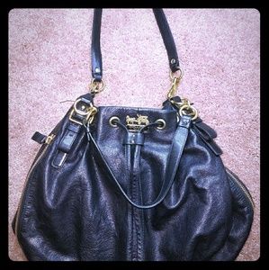 Coach black leather drawstring handbag
